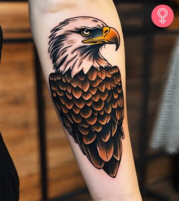 A traditional bald eagle tattoo on the forearm