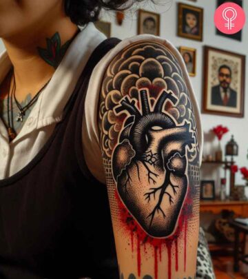 A woman with a black bleeding heart tattoo